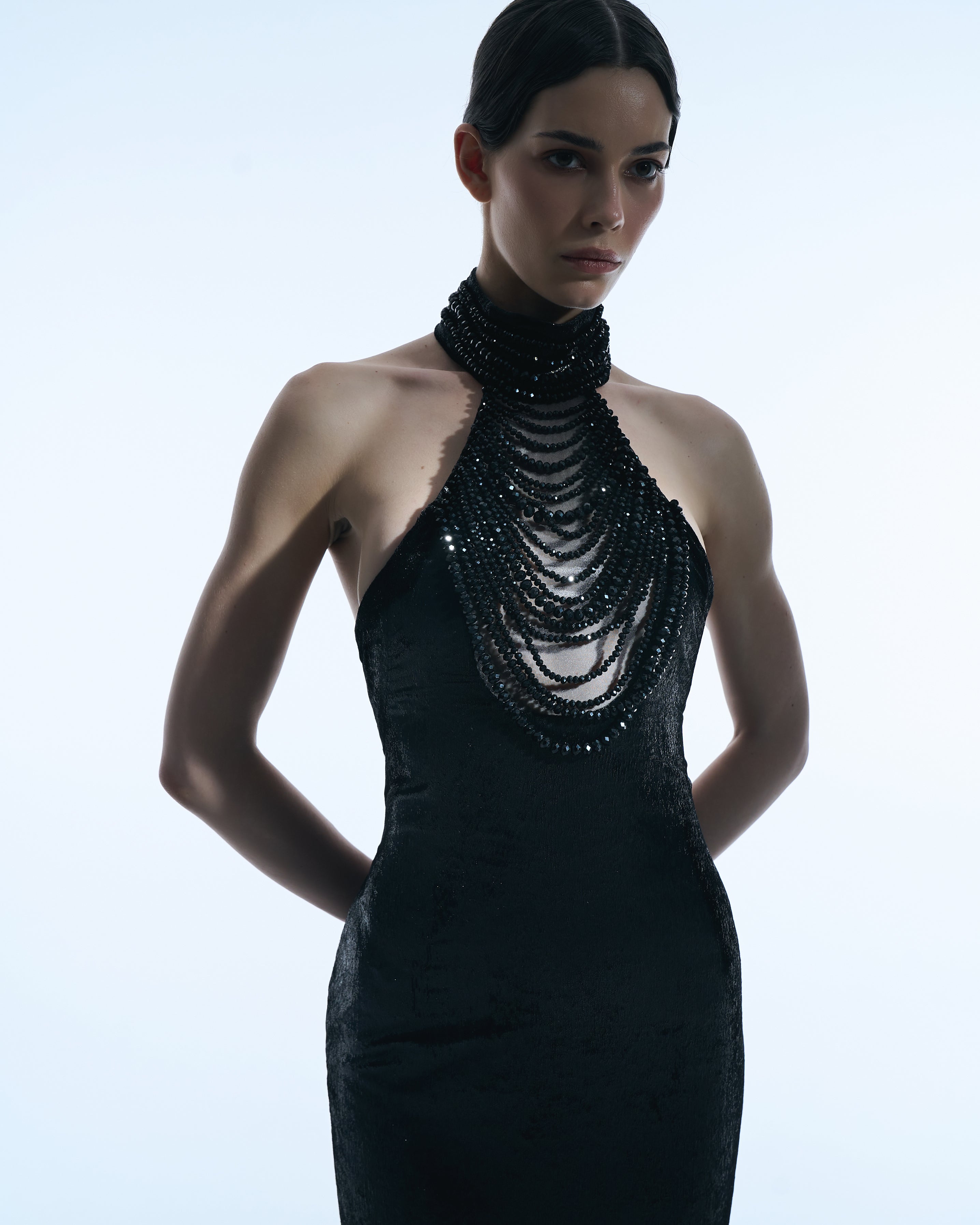 Black gown with cascading crystal neckline