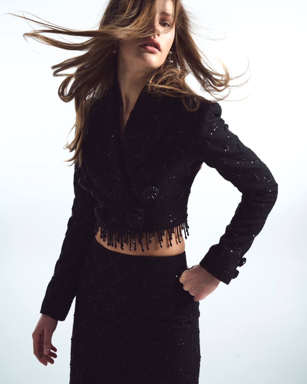 Short tweed suit with sequin trim