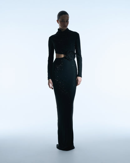Black long-sleeve gown with floral waist detail