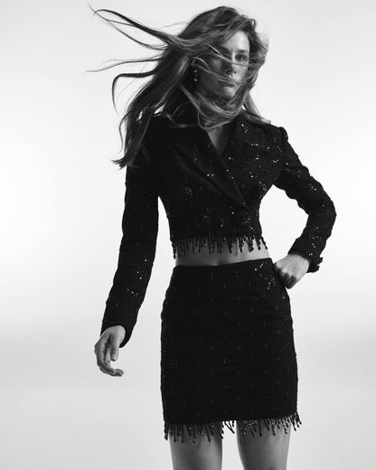 Short tweed suit with sequin trim