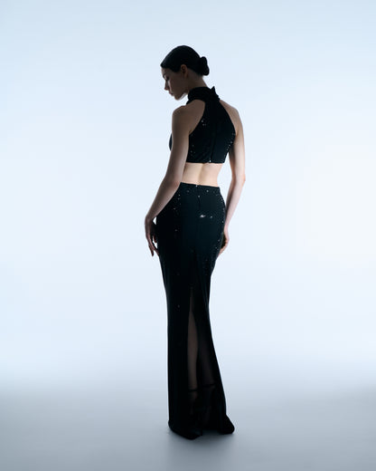 Black halter gown with floral waist detail